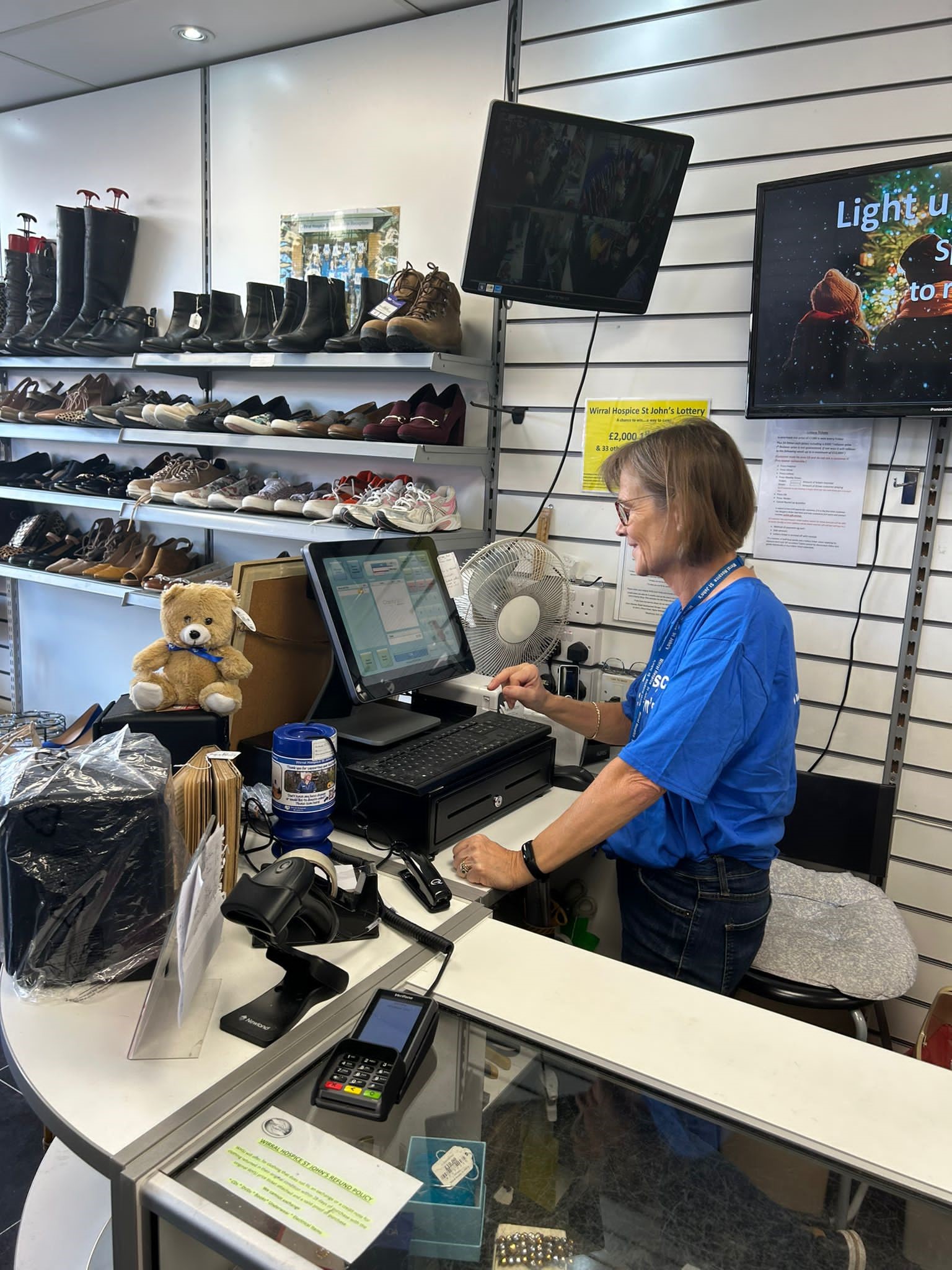 https://www.wirralhospice.org/wp-content/uploads/2023/10/Emma-West-Kirby-working-till.jpg